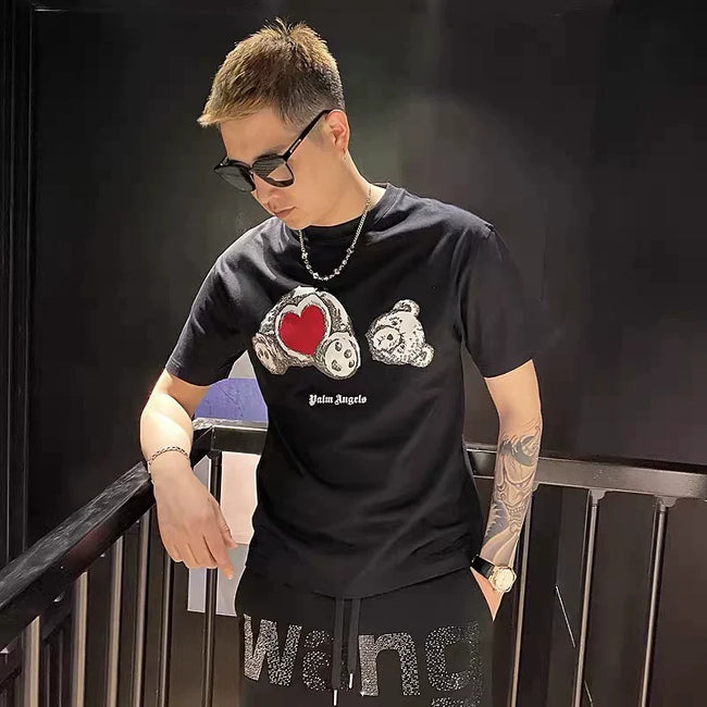 Palm Angel Black Heart Broken Bear Graphic Tee Hover Image